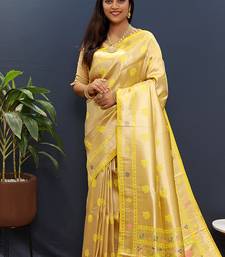 Beige gold silk blend saree with yellow floral zari weaving & rich brocade pallu