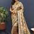 Gold silk blend saree with dark green floral zari weaving & rich brocade pallu