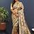 Gold silk blend saree with dark green floral zari weaving & rich brocade pallu