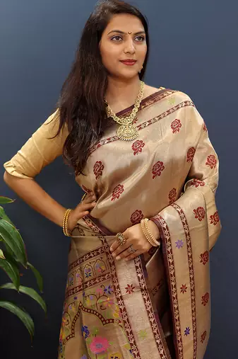 Gold silk blend saree with maroon floral zari weaving & rich brocade pallu