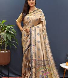 Gold silk blend saree with grey floral zari weaving & rich brocade pallu