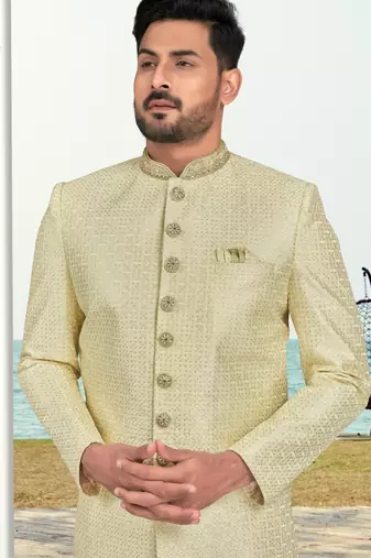 Light lemon colour full computer amrodery sherwani set with thred and stone work with handwork botton, collar