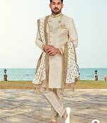 Cream colour havy sherwani set with less, thred & zari hand work