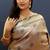 Gold silk blend saree with grey floral zari weaving & rich brocade pallu