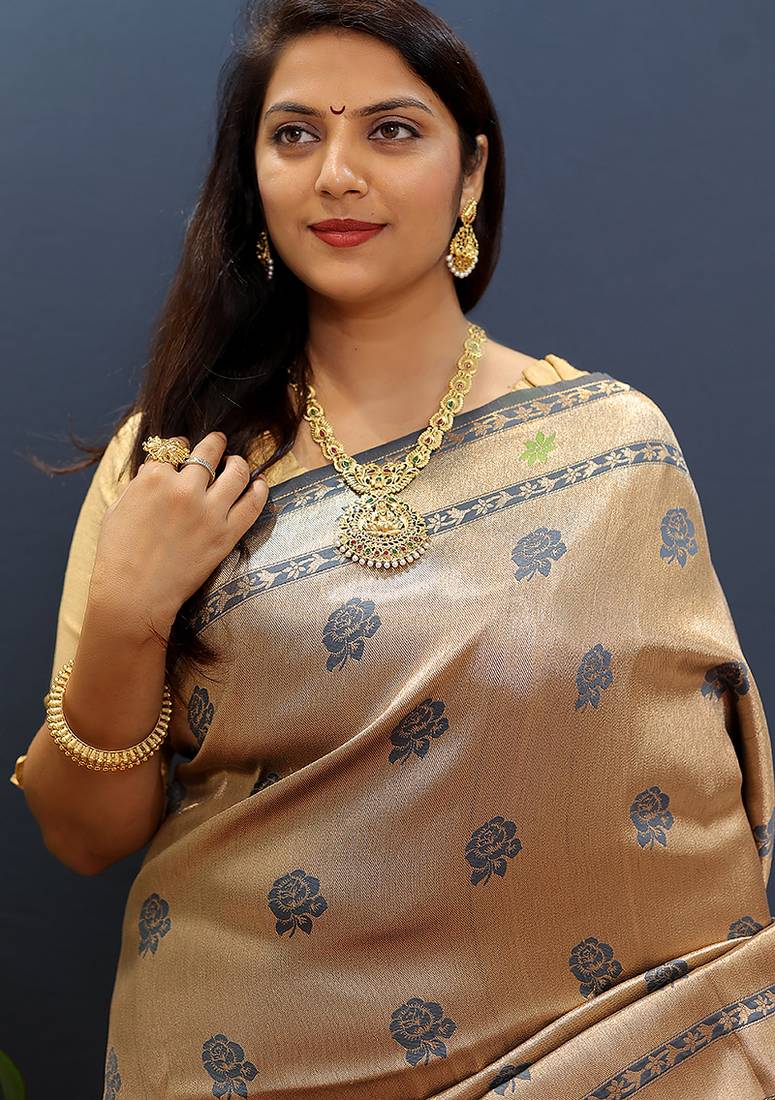 Gold silk blend saree with grey floral zari weaving & rich brocade pallu