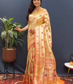 Beige gold silk blend saree with orange floral zari weaving & rich brocade pallu