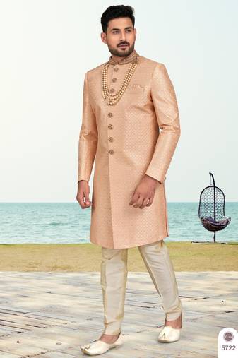 Peach colour full computer amrodery sherwani set with thred and stone work with handwork botton, collar