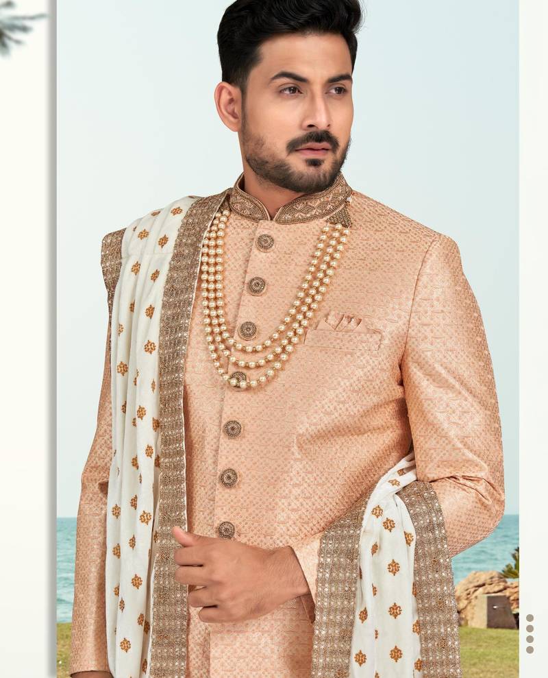 Peach colour full computer amrodery sherwani set with thred and stone work with handwork botton, collar