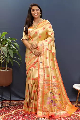 Beige gold silk blend saree with orange floral zari weaving & rich brocade pallu