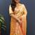 Beige gold silk blend saree with orange floral zari weaving & rich brocade pallu