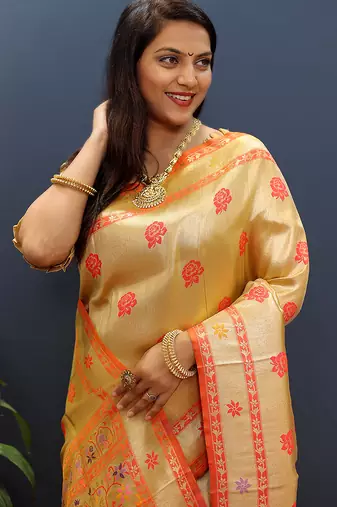 Beige gold silk blend saree with orange floral zari weaving & rich brocade pallu