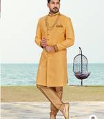Yellow colour full computer amrodery two pice sherwani set with thred  work with fancy botton