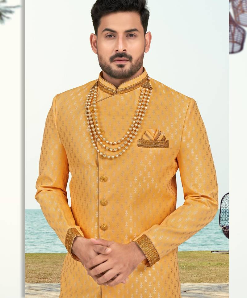 Yellow colour full computer amrodery two pice sherwani set with thred  work with fancy botton