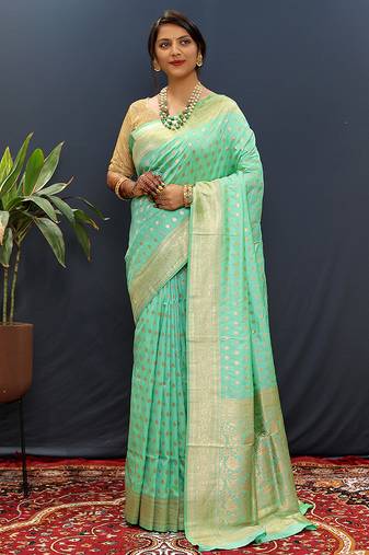 Sea green banarasi silk blend saree with zari buti & rich woven border