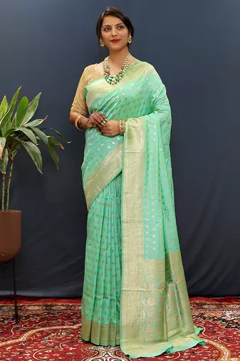 Sea green banarasi silk blend saree with zari buti & rich woven border