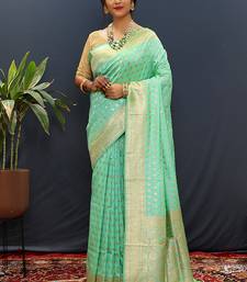 Sea green banarasi silk blend saree with zari buti & rich woven border
