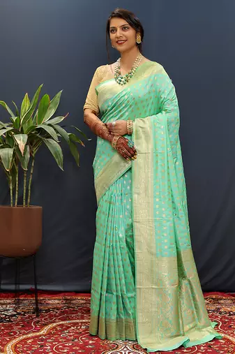 Sea green banarasi silk blend saree with zari buti & rich woven border