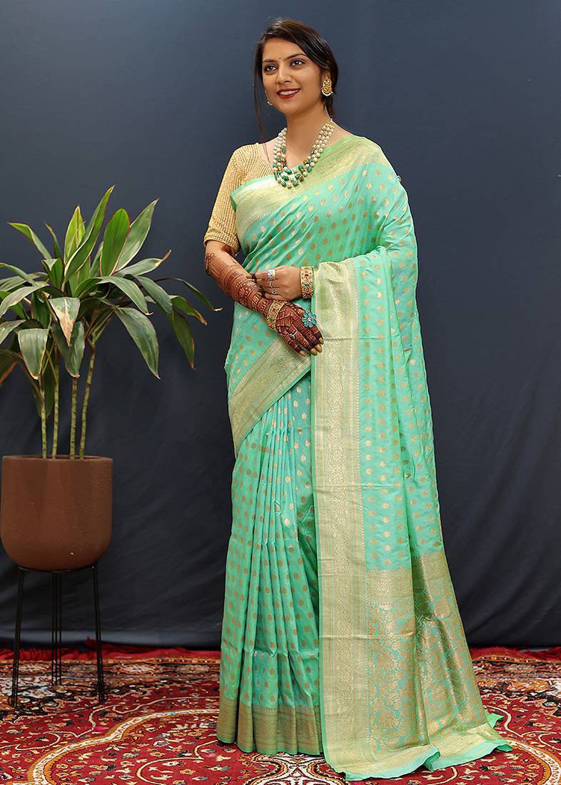 Sea green banarasi silk blend saree with zari buti & rich woven border