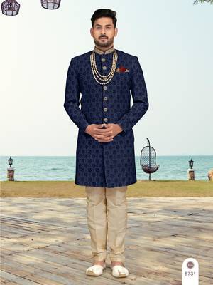 Nevy blue colour  full computer amrodery sherwani set with thred, stone & hand work with fancy botton 1