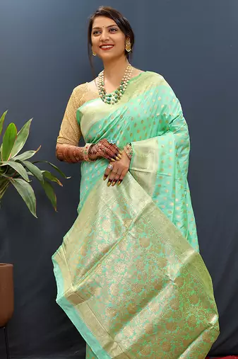 Sea green banarasi silk blend saree with zari buti & rich woven border