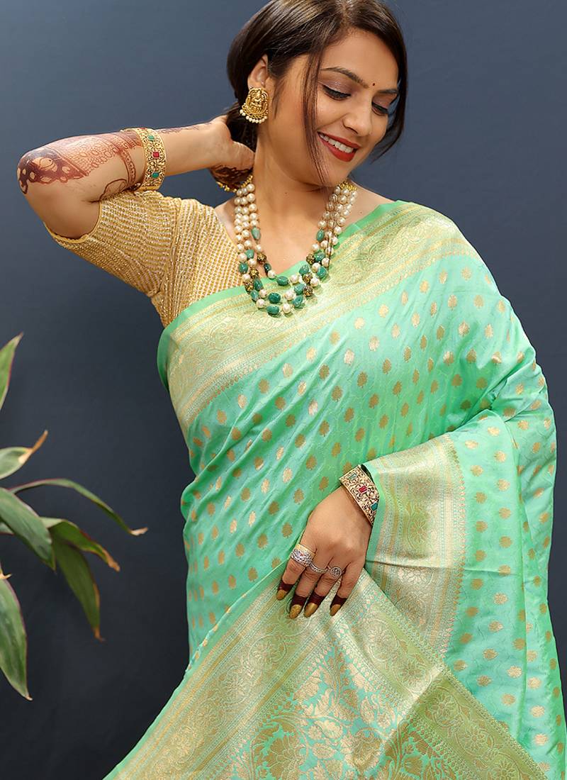 Sea green banarasi silk blend saree with zari buti & rich woven border