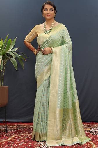 Mint green banarasi silk blend saree with zari buti & rich woven border