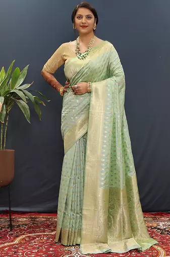 Mint green banarasi silk blend saree with zari buti & rich woven border