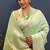 Mint green banarasi silk blend saree with zari buti & rich woven border