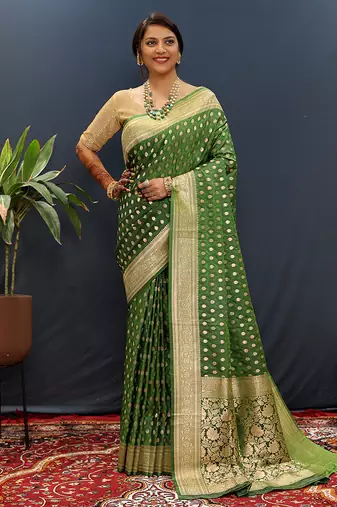 Dark green banarasi silk blend saree with zari buti & rich woven border