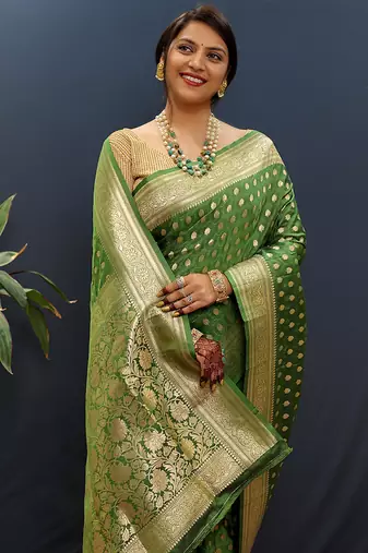 Dark green banarasi silk blend saree with zari buti & rich woven border