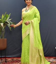 Parrot green banarasi silk blend saree with zari buti & rich woven border