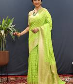 Parrot green banarasi silk blend saree with zari buti & rich woven border