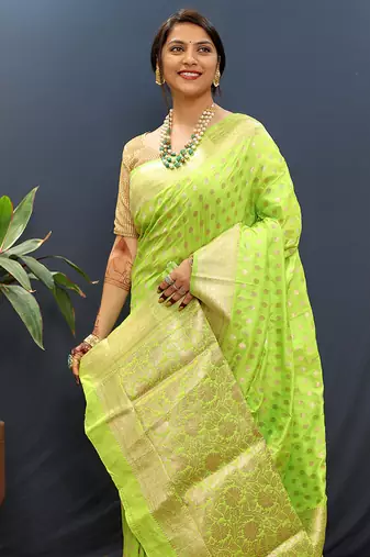 Parrot green banarasi silk blend saree with zari buti & rich woven border