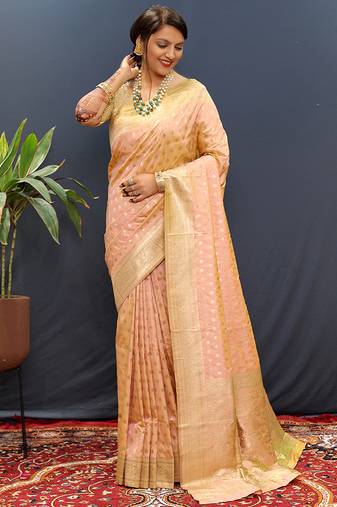 Peach banarasi silk blend saree with zari buti & rich woven border
