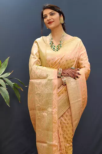 Peach banarasi silk blend saree with zari buti & rich woven border