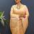 Peach banarasi silk blend saree with zari buti & rich woven border