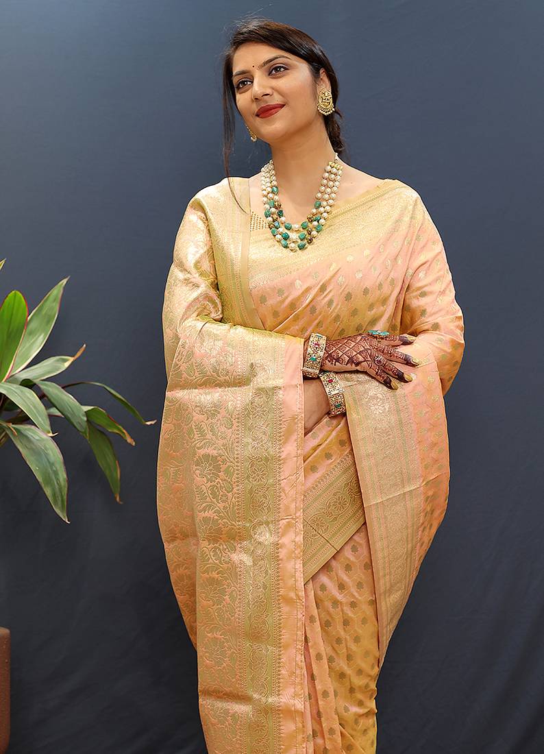 Peach banarasi silk blend saree with zari buti & rich woven border