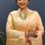 Peach banarasi silk blend saree with zari buti & rich woven border