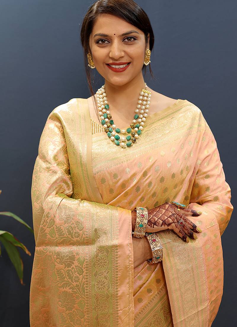 Peach banarasi silk blend saree with zari buti & rich woven border