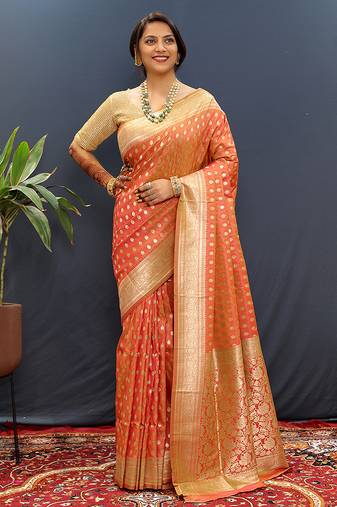 Orange banarasi silk blend saree with zari buti & rich woven border