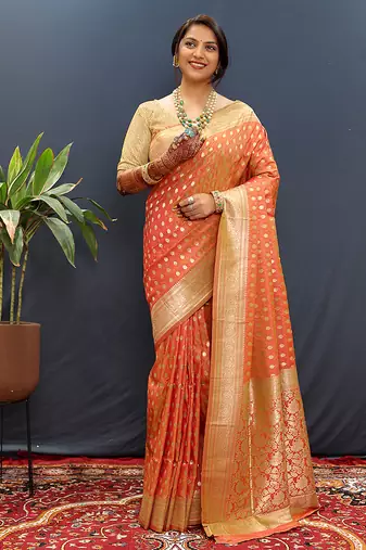 Orange banarasi silk blend saree with zari buti & rich woven border