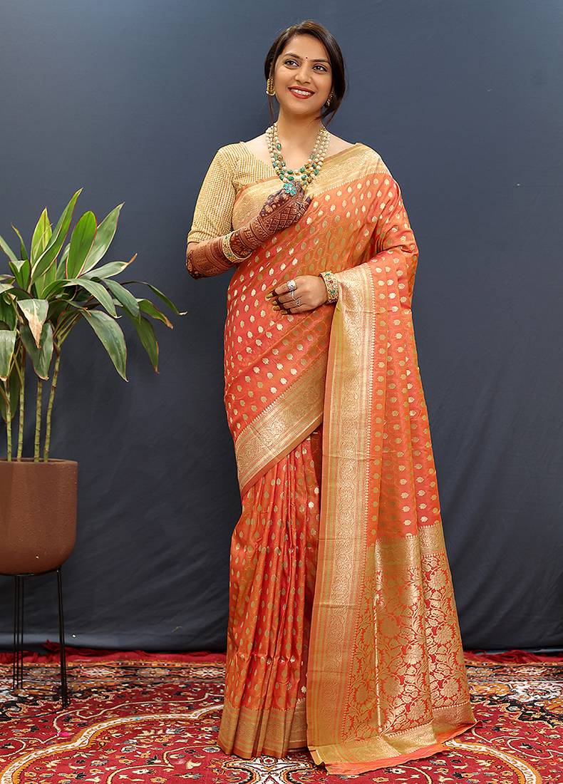 Orange banarasi silk blend saree with zari buti & rich woven border