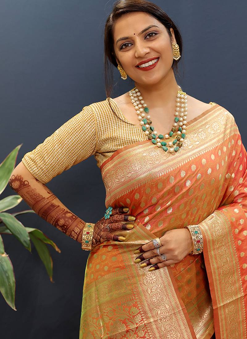 Orange banarasi silk blend saree with zari buti & rich woven border