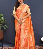 Orange banarasi silk blend saree with all-over gold zari floral jaal