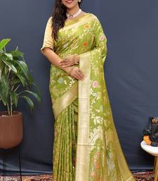 Light green banarasi silk blend saree with all-over gold zari floral jaal