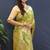 Light green banarasi silk blend saree with all-over gold zari floral jaal