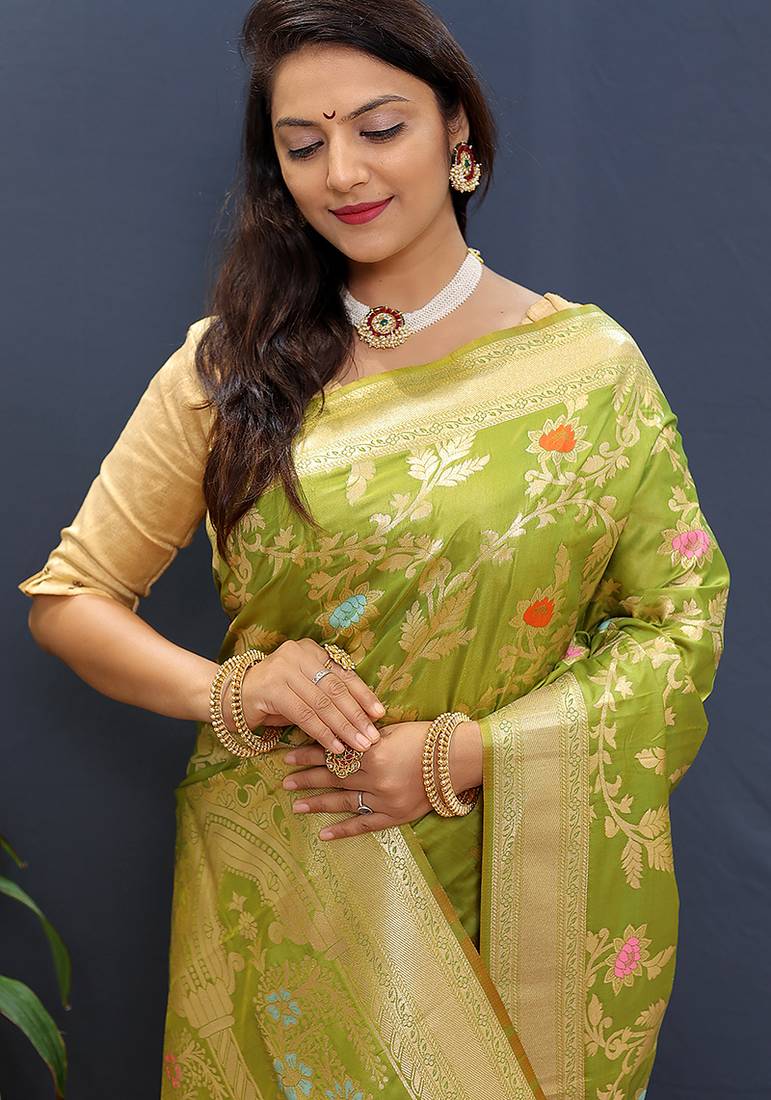 Light green banarasi silk blend saree with all-over gold zari floral jaal