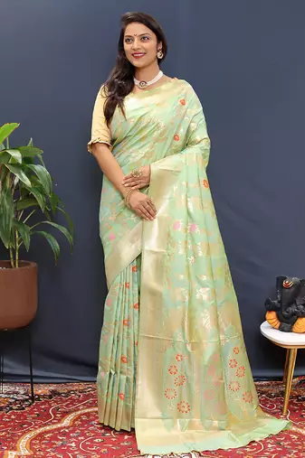 Mint green banarasi silk blend saree with all-over gold zari floral jaal