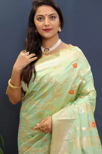 Mint green banarasi silk blend saree with all-over gold zari floral jaal