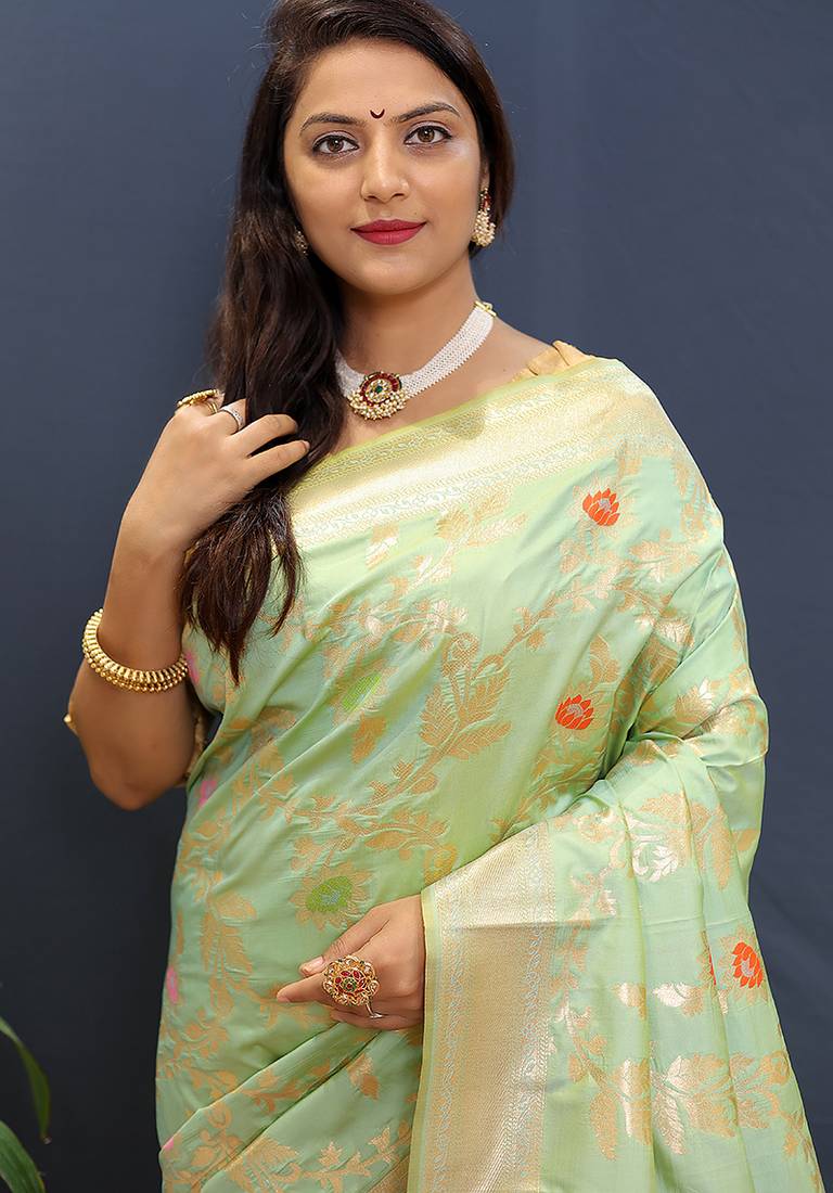 Mint green banarasi silk blend saree with all-over gold zari floral jaal